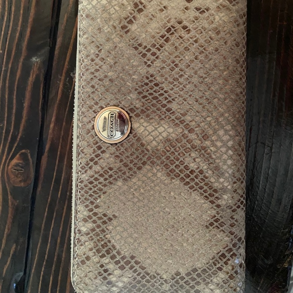 Zip around wallet, GENTLY used, no tags